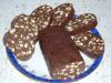 Rollo de chocolate elaborado con hojaldre y masa de levadura, además de galletas Rollo de galleta casera con cacao